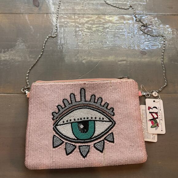 America & Beyond Pink Bling Eye Clutch NWT - Picture 1 of 11